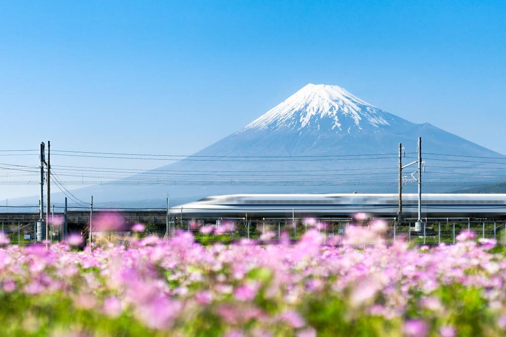 Shinkansen train travelling past Mt. Fuji